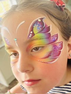 Girl with butterfly face paint